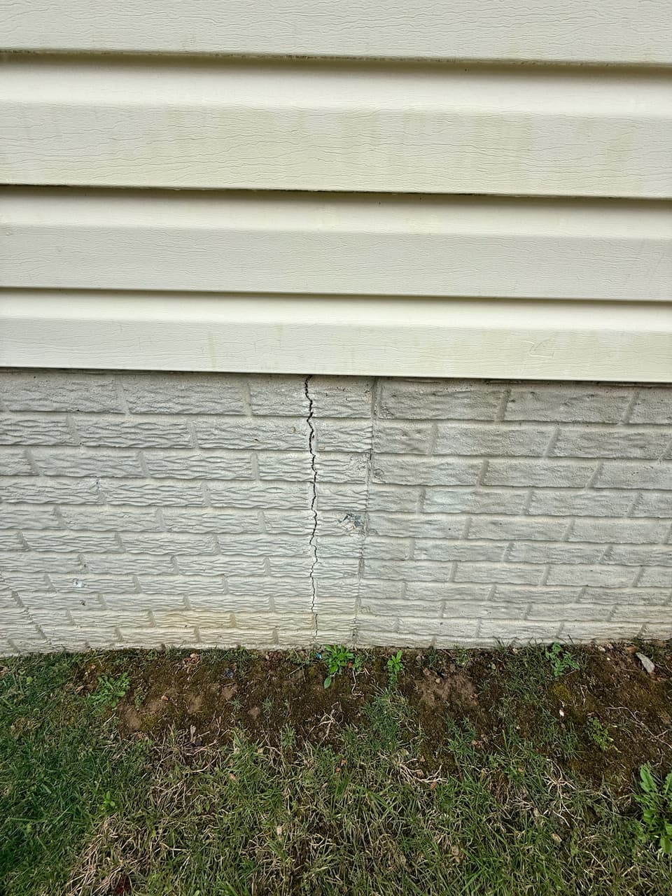 Exterior wall and grade line after the work is complete