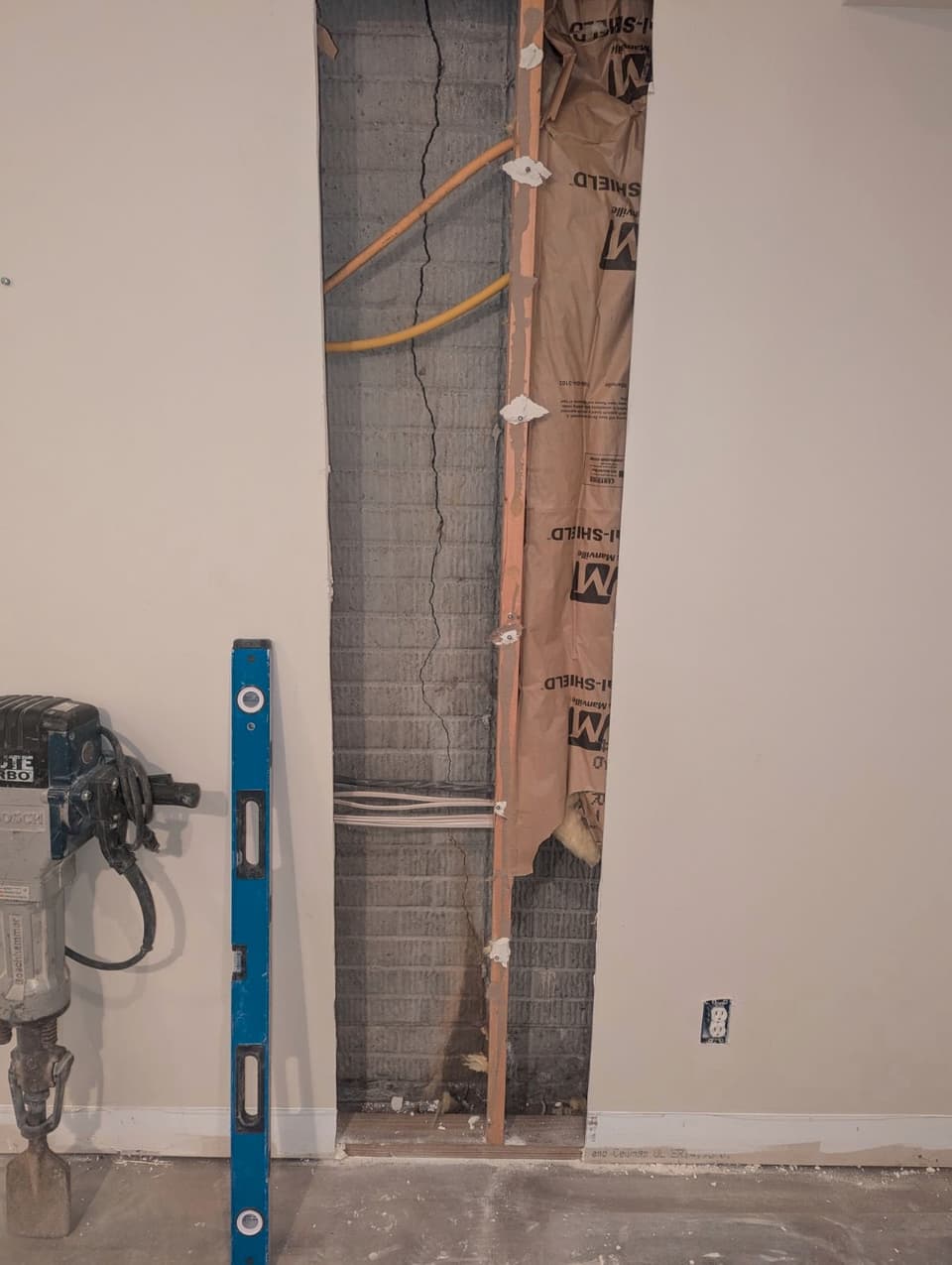 Crack width measured to judge type and activity